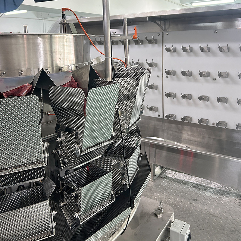 Sistema automático de pesagem e embalagem de caixas para bifes Ribeye